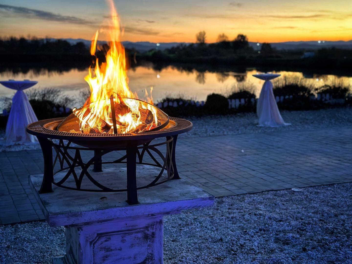 Fire pit by the lake at sunset, Domeniile Streiului